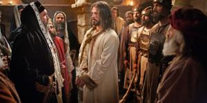 Jesus stands on trial before Caiaphas and the Sanhedrin in this still from a Life of Jesus Christ Bible Video. Courtesy image from The Church of Jesus Christ of Latter-day Saints.