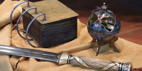 Artistic replicas of the gold plates, the sword of Laban, and the Liahona by David Baird. Photo by Daniel Smith.